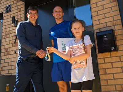Cllr Holt with Aaron and Caitlyn as they settle into their new home Cllr Holt with Aaron and Caitlyn as they settle into their new home